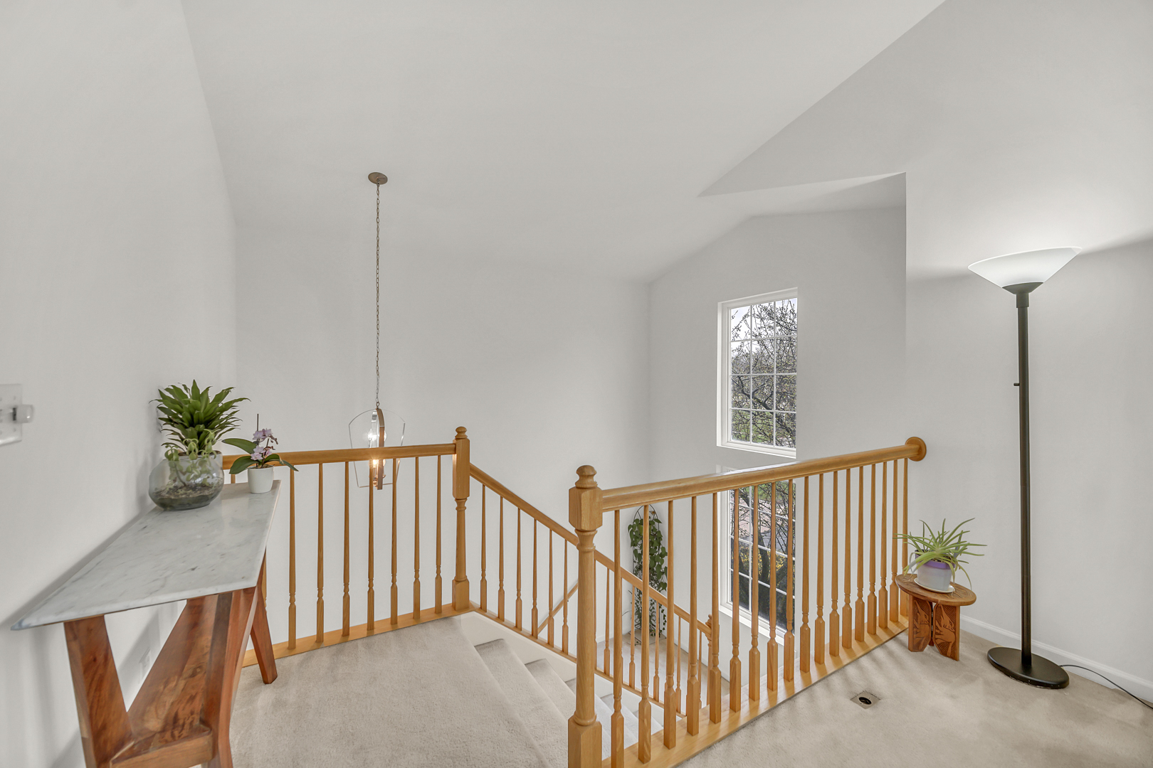 1204 Georgetown Way Vernon Hills, IL 60061 - Photo 7 of 30 a view of hallway with furniture and floor to ceiling window
