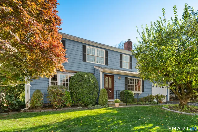 front view of a house with a yard