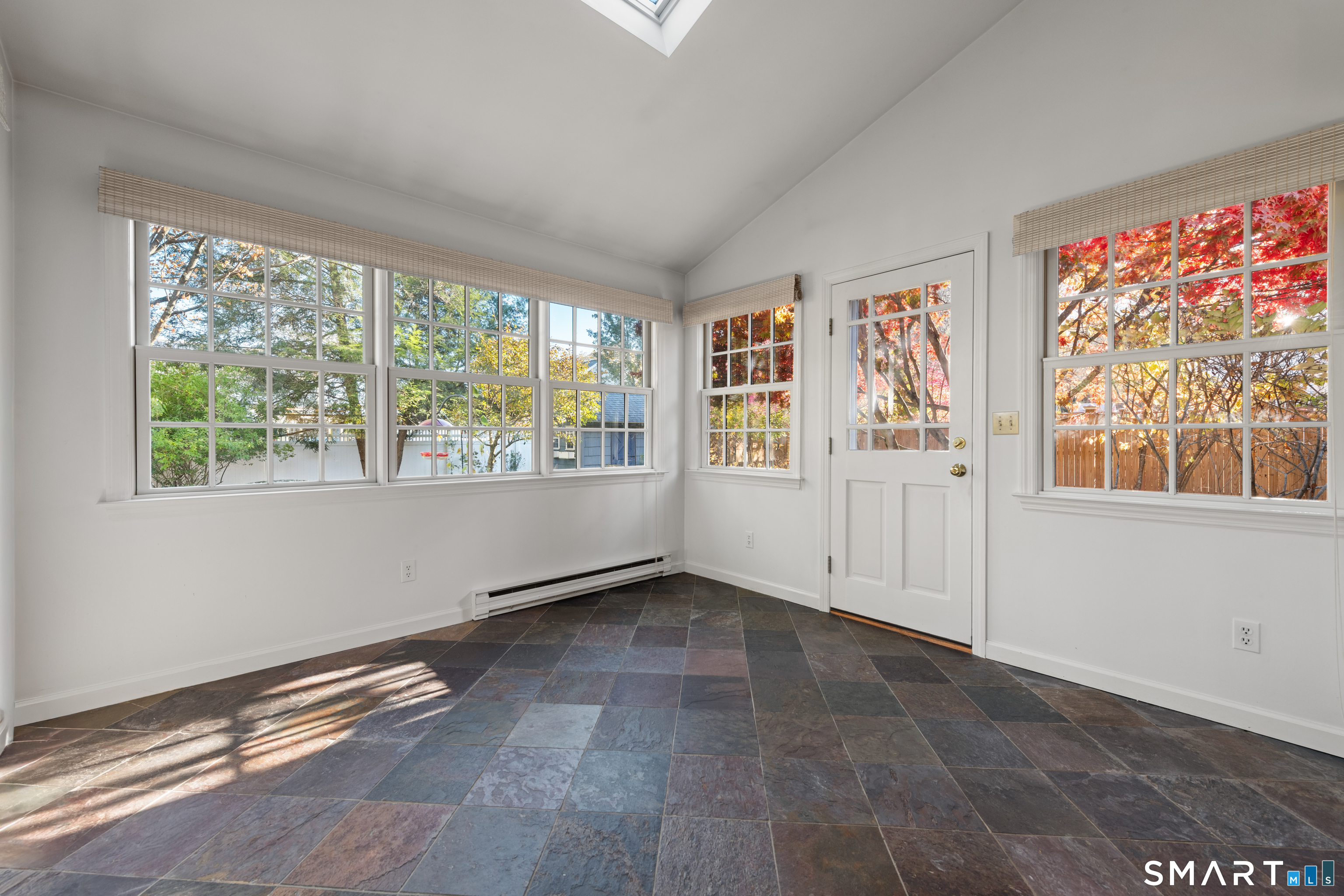 56 Drake Lane Fairfield, CT 06824 - Photo 16 of 35 wooden floor in an empty room with a window