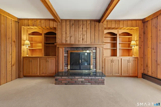 a living room with a fireplace