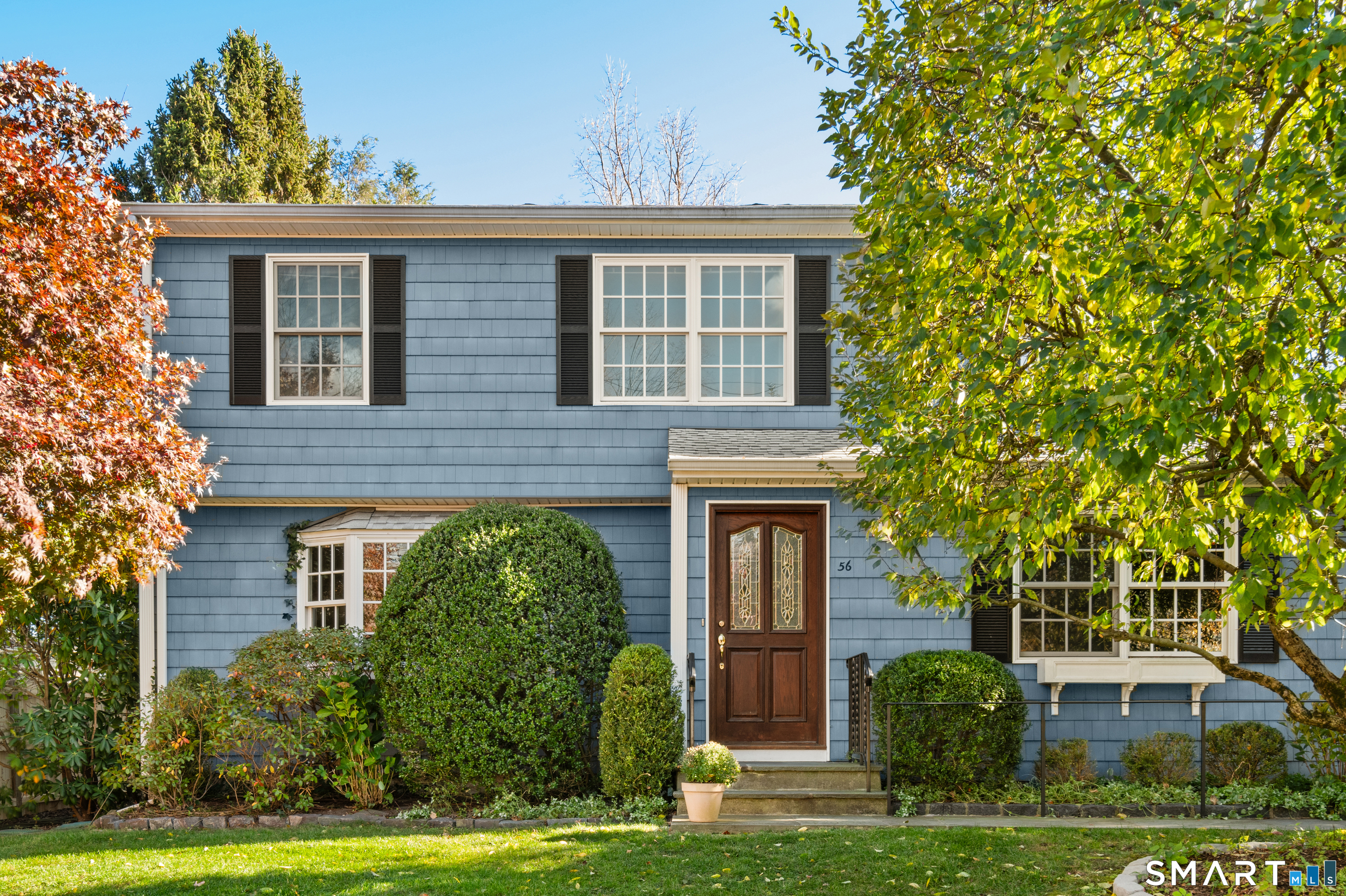 56 Drake Lane Fairfield, CT 06824 - Photo 2 of 35 front view of house with a yard