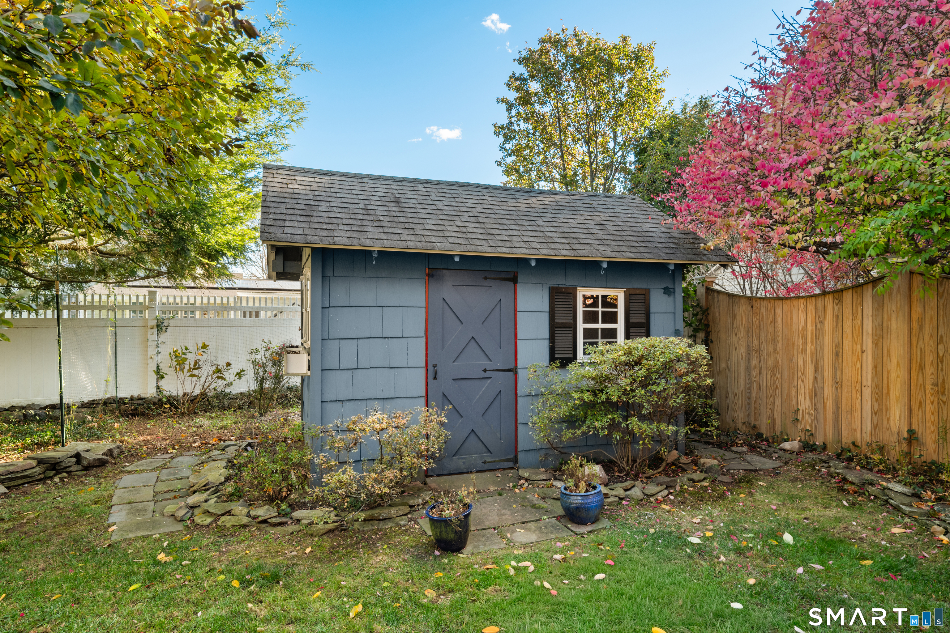 56 Drake Lane Fairfield, CT 06824 - Photo 32 of 35 front view of a house with a yard
