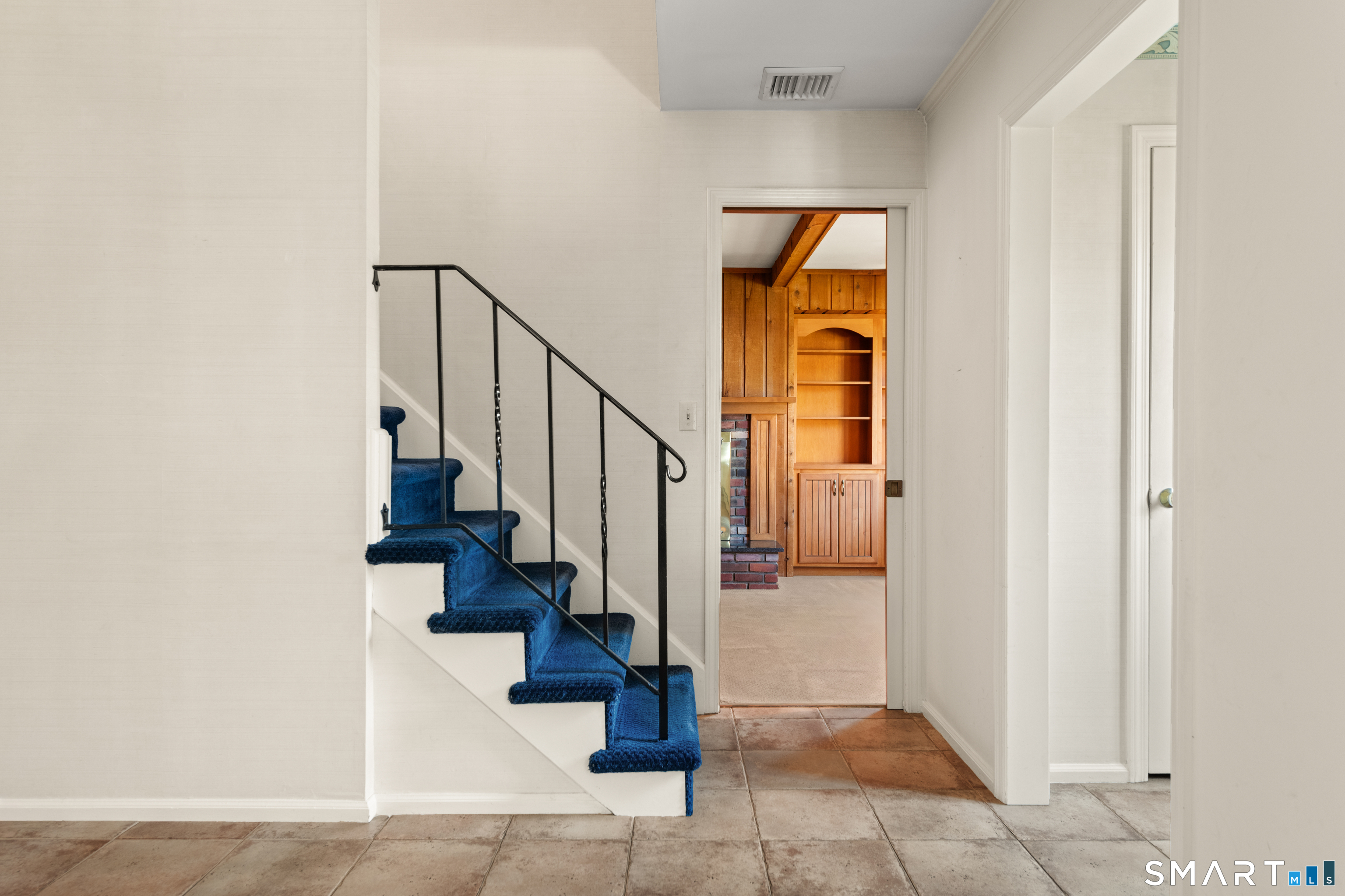 56 Drake Lane Fairfield, CT 06824 - Photo 5 of 35 a view of staircase with white walls and railing
