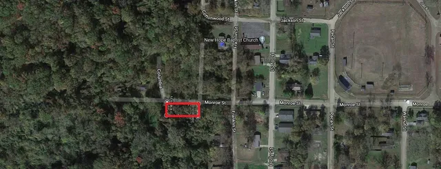 a view of a bathroom with a shower and sink