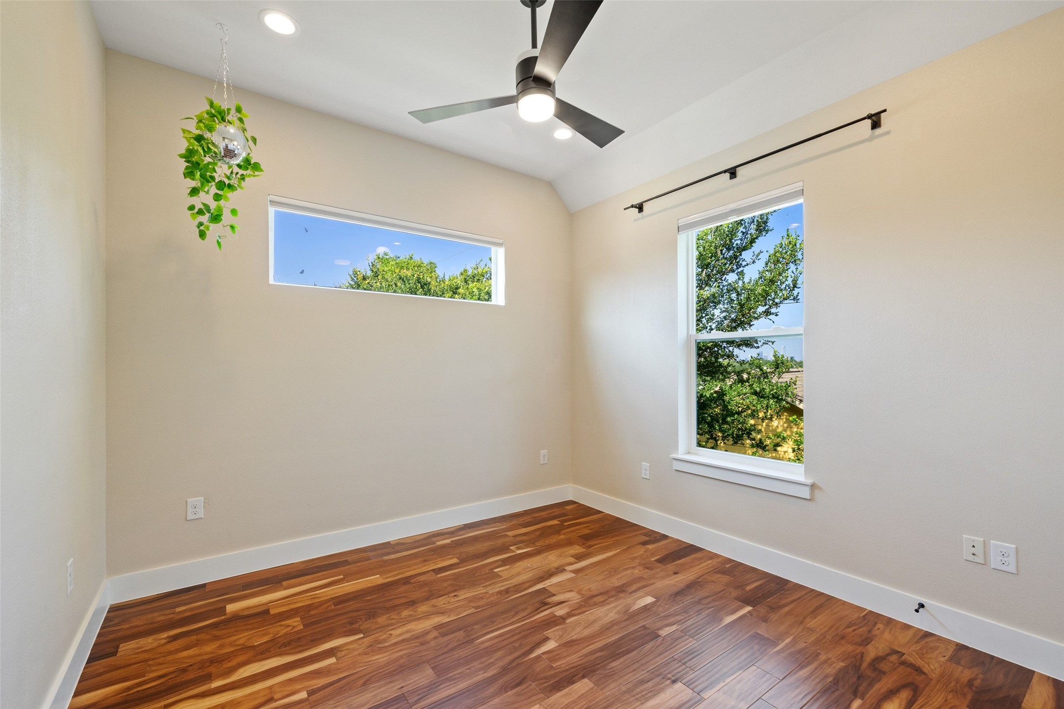 5601 Jackie Robinson Street, Unit 1 Austin, TX 78721 - Photo 29 of 40 Upstairs, a custom stair runner leads to two spacious secondary bedrooms.