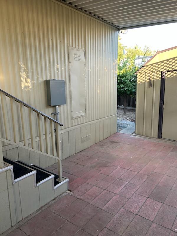 3955 Coffee Road, Unit 53 Modesto, CA 95355 - Photo 9 of 26 a view of a porch with wooden floor