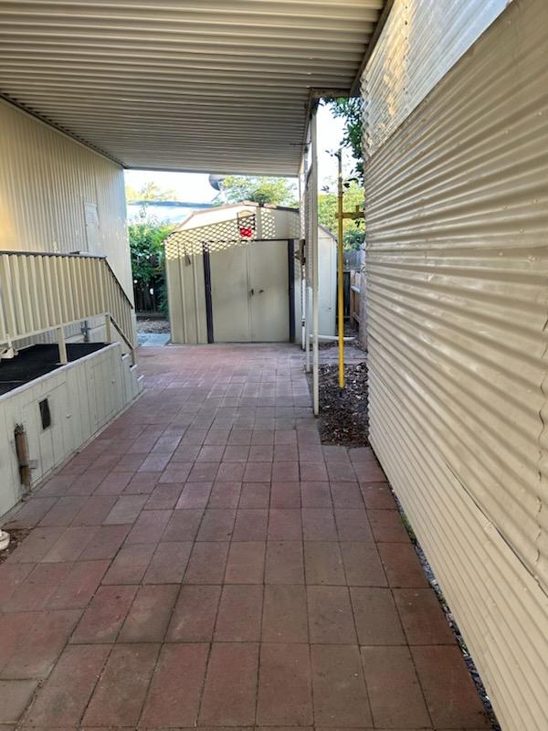 3955 Coffee Road, Unit 53 Modesto, CA 95355 - Photo 10 of 26 a view of backyard with cabin