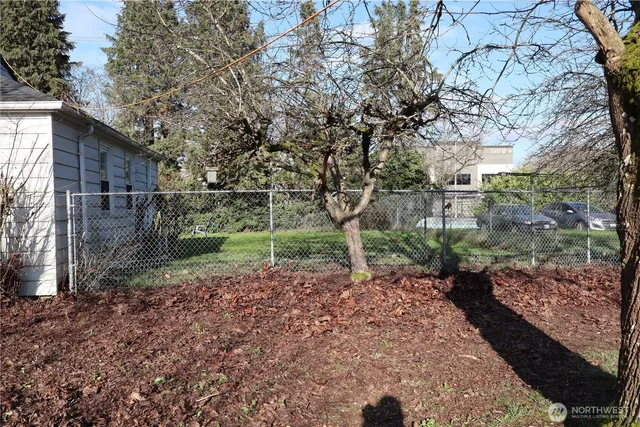 a backyard of a house with lots of green space