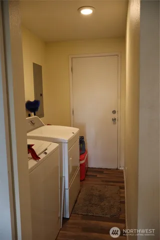 a utility room with dryer and washer