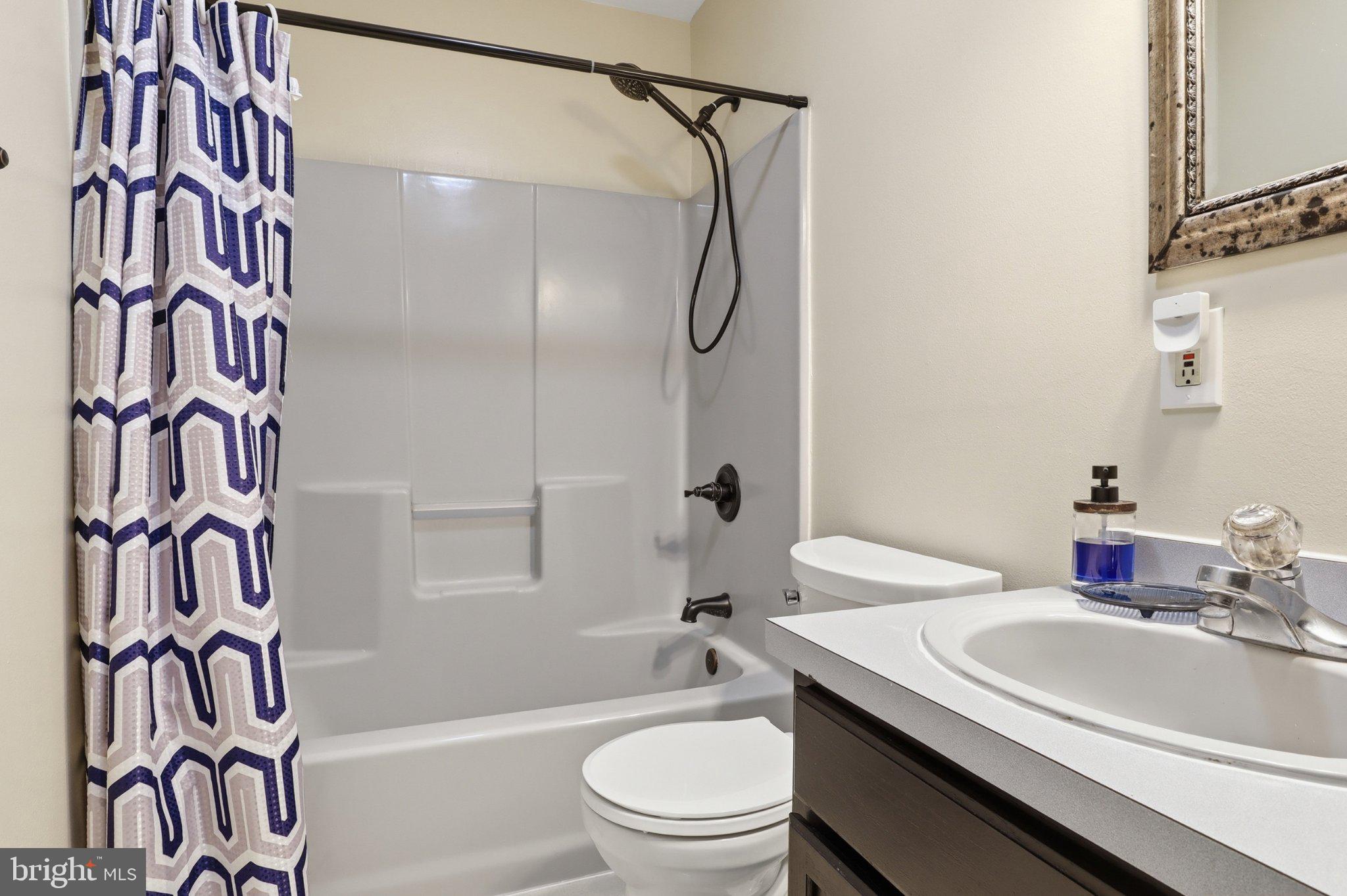 491 Garvine Mill Road Fawn Grove, PA 17321 - Photo 18 of 47 a bathroom with a sink toilet and shower