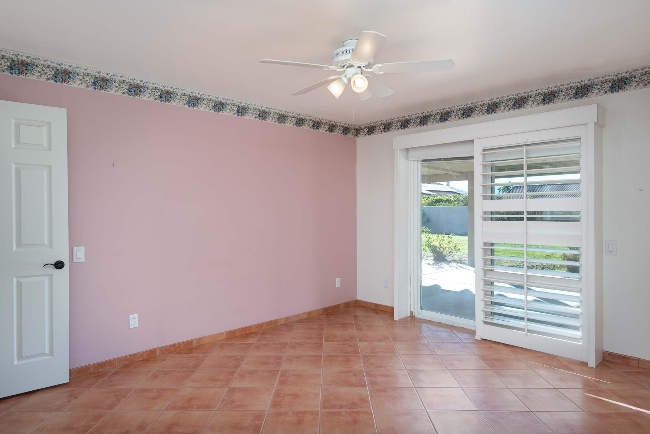 67705 Ovante Road Cathedral City, CA 92234 - Photo 17 of 34 a view of an empty room with a window
