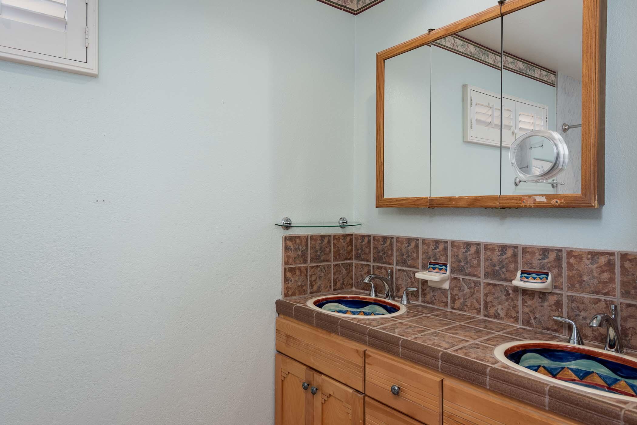 67705 Ovante Road Cathedral City, CA 92234 - Photo 19 of 34 a room with storage and utility