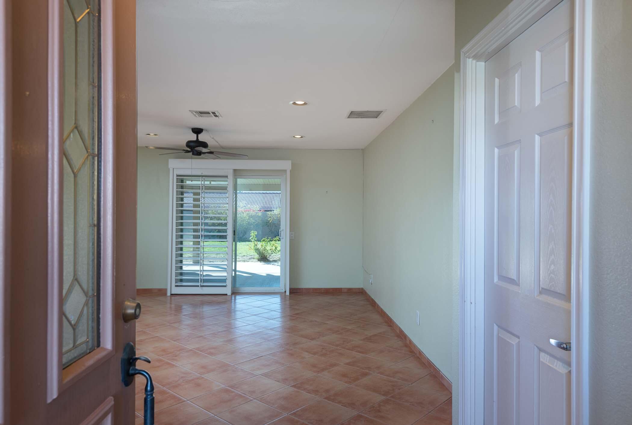 67705 Ovante Road Cathedral City, CA 92234 - Photo 4 of 34 a view of entryway with wooden floor