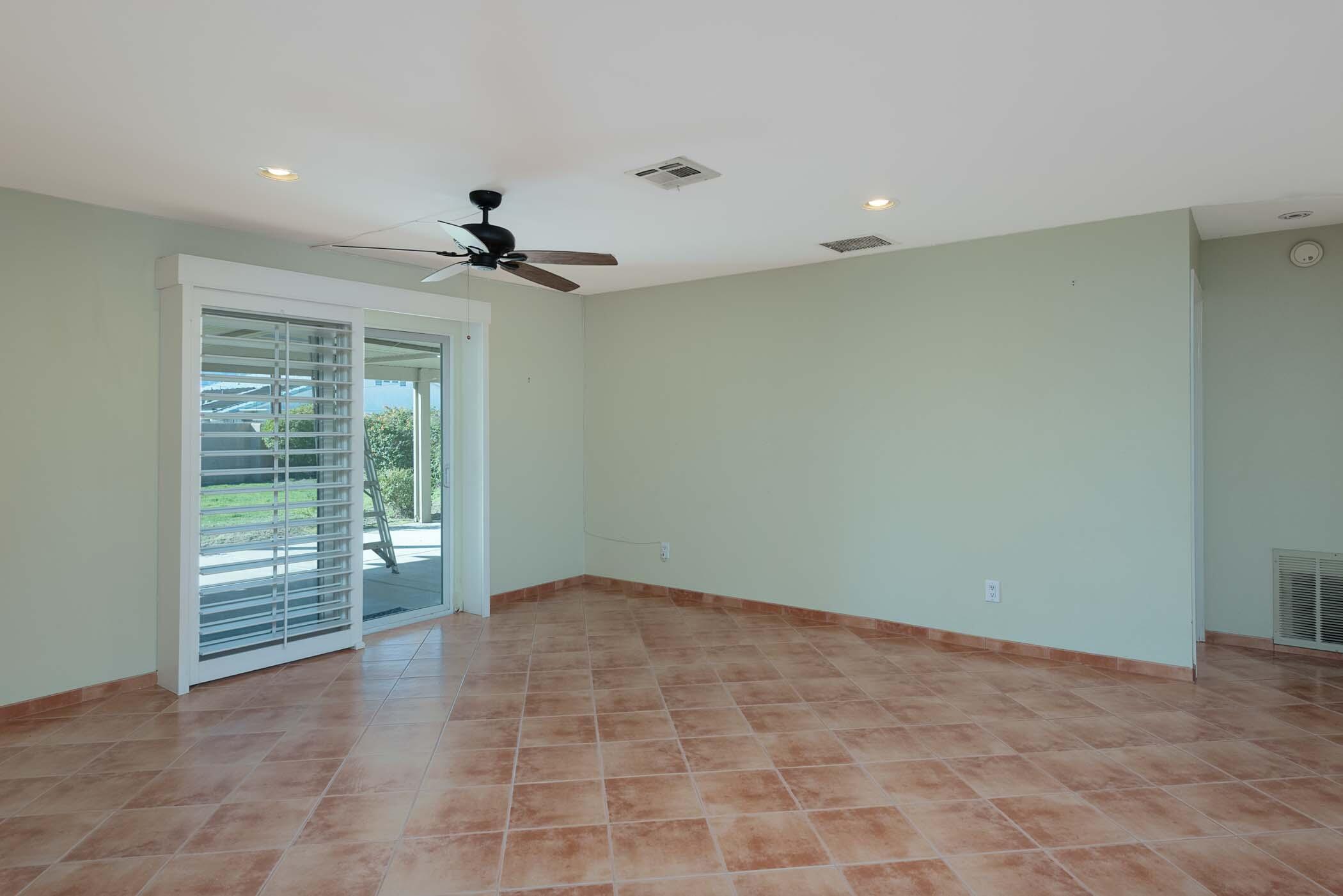 67705 Ovante Road Cathedral City, CA 92234 - Photo 7 of 34 a view of an empty room with a window