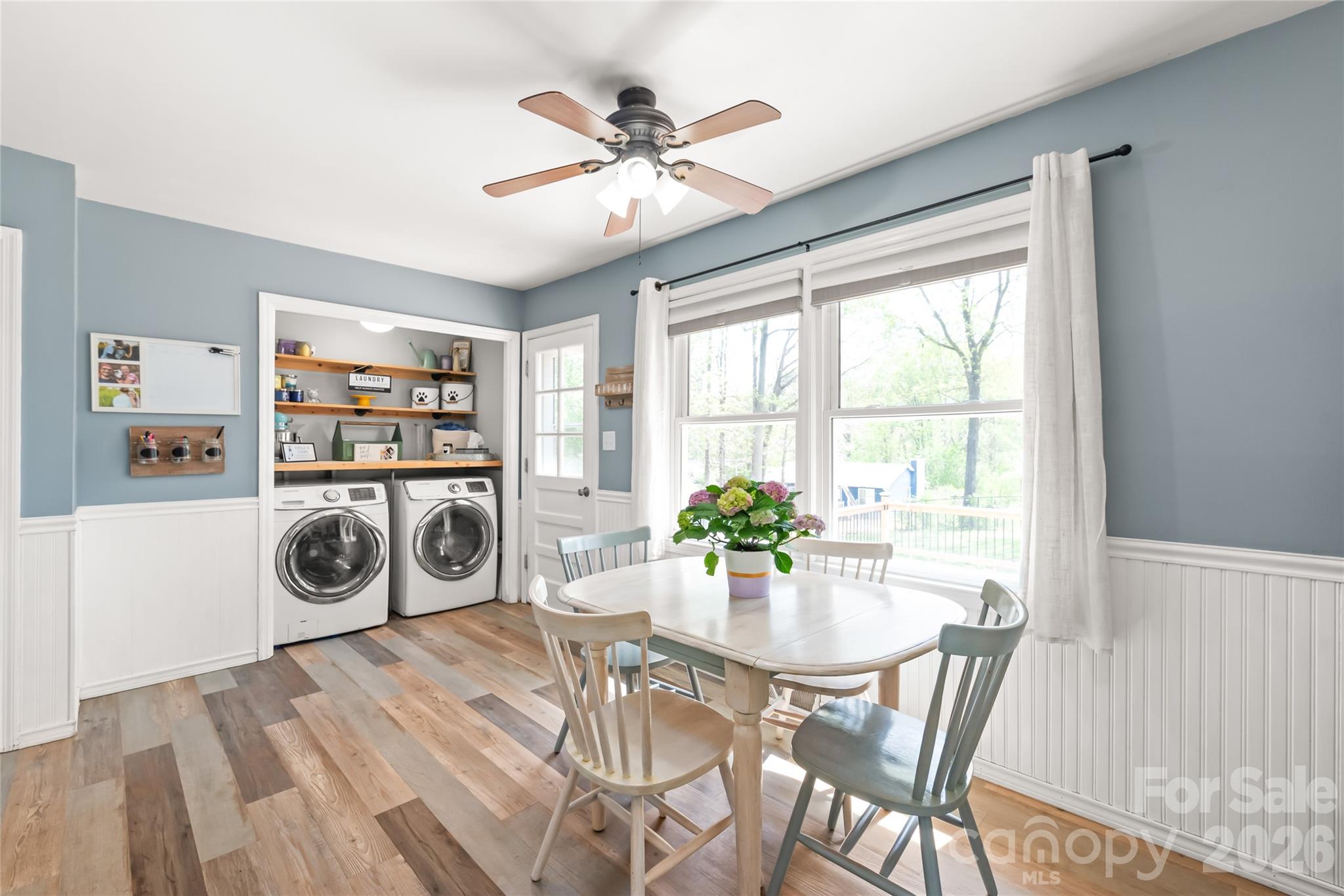104 Pine Tree Drive Fort Mill, SC 29715 - Photo 11 of 35 a view of a dining room with furniture window and wooden floor