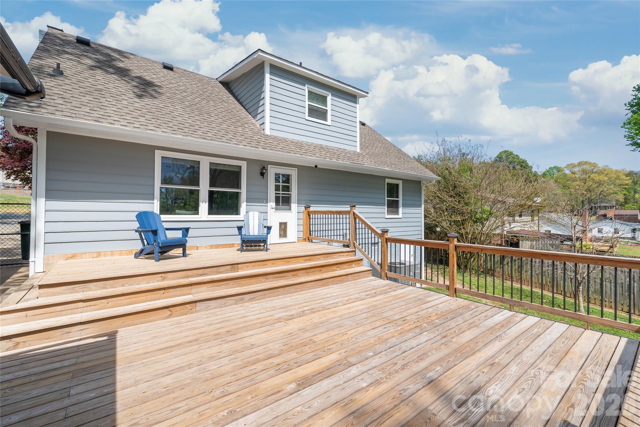 104 Pine Tree Drive Fort Mill, SC 29715 - Photo 26 of 35 a view of a house with a balcony and wooden floor