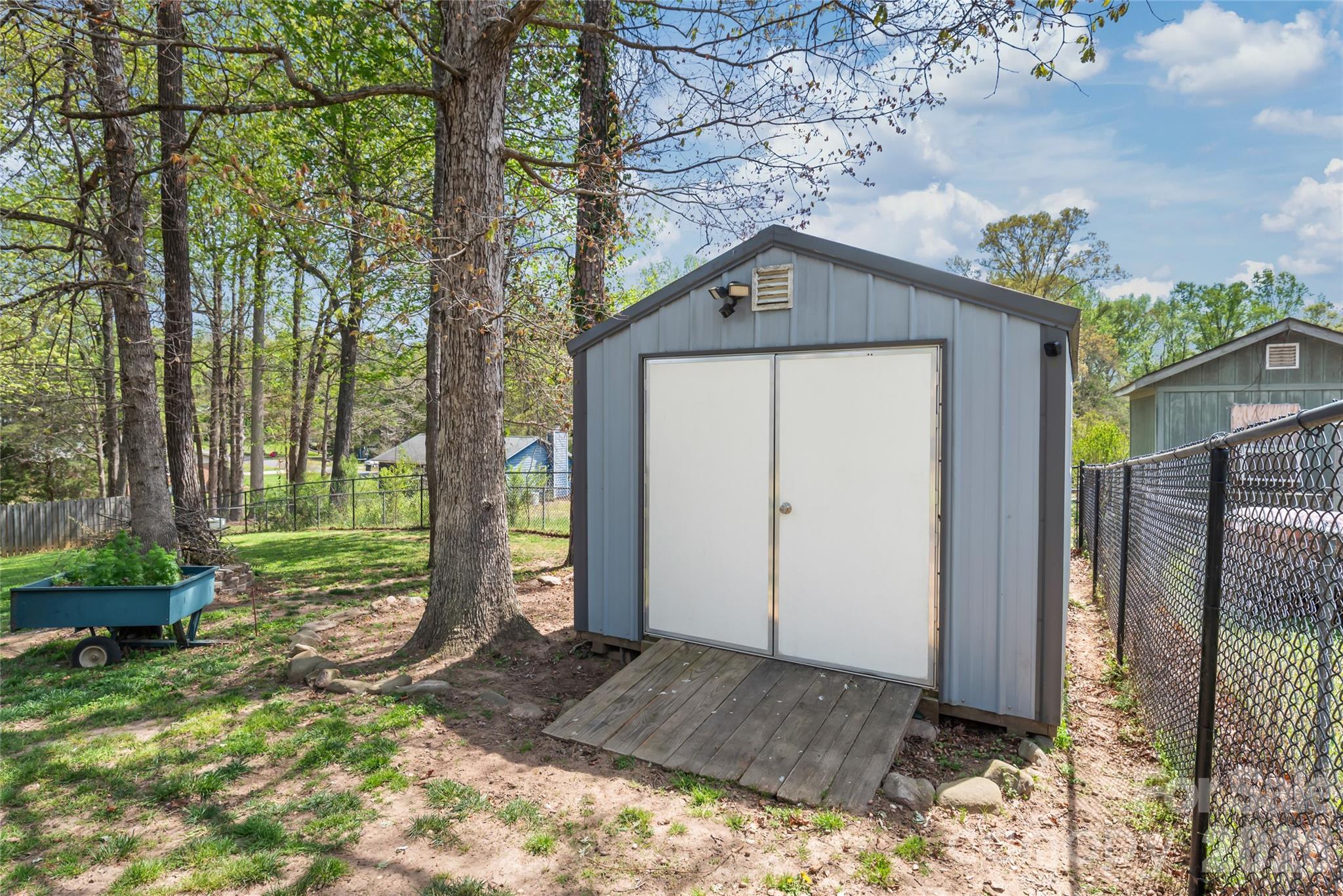 104 Pine Tree Drive Fort Mill, SC 29715 - Photo 32 of 35 a view of a house with a small yard