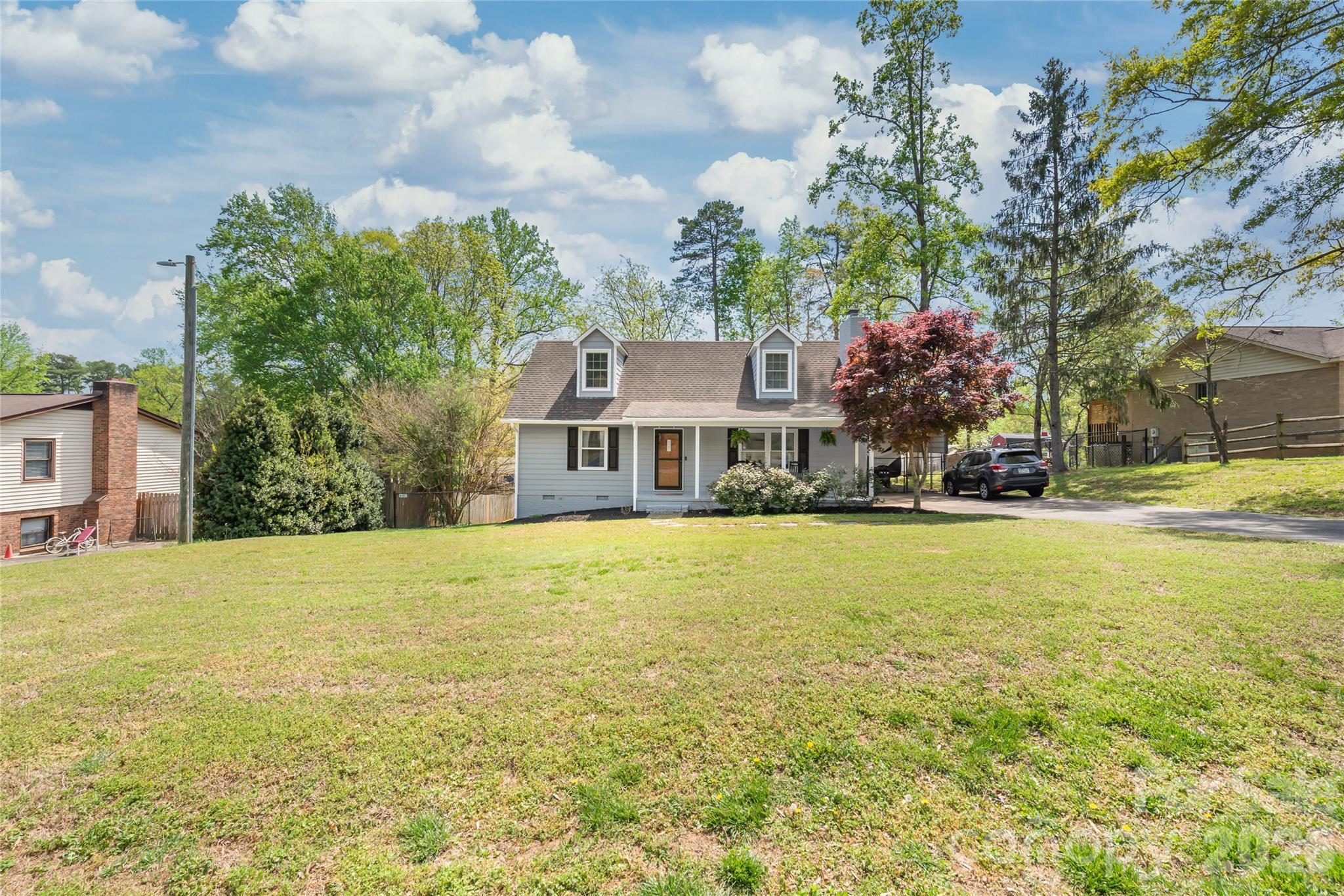 104 Pine Tree Drive Fort Mill, SC 29715 - Photo 33 of 35 a front view of a house with a garden