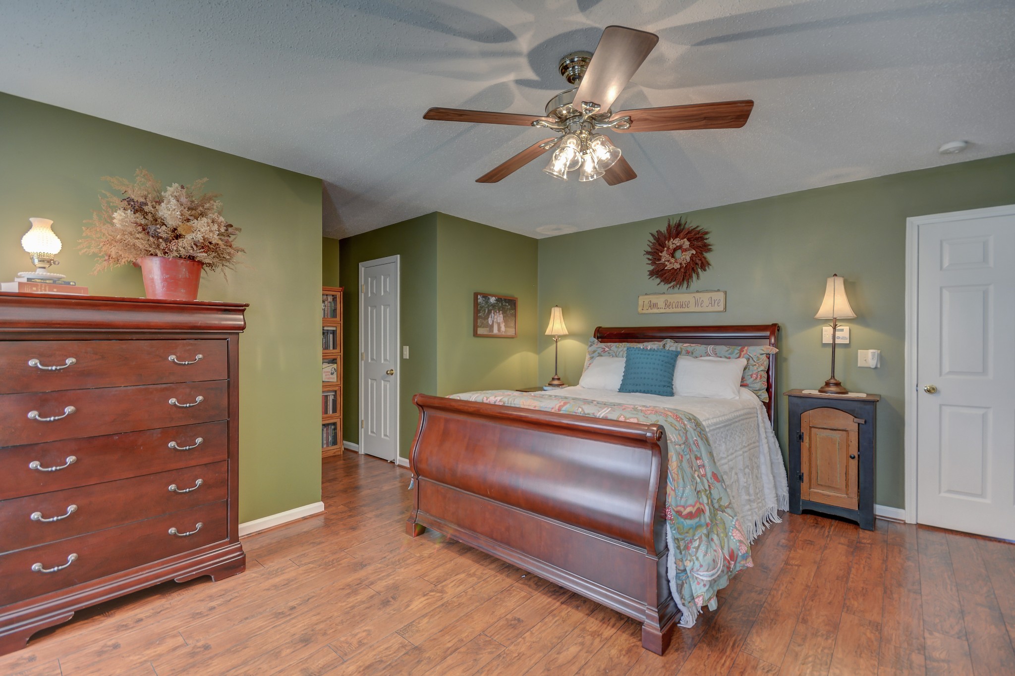 2545 Plainview Pvt Ln Spring Hill Spring Hill, TN 37174 - Photo 17 of 34 a bedroom with a bed and a chandelier