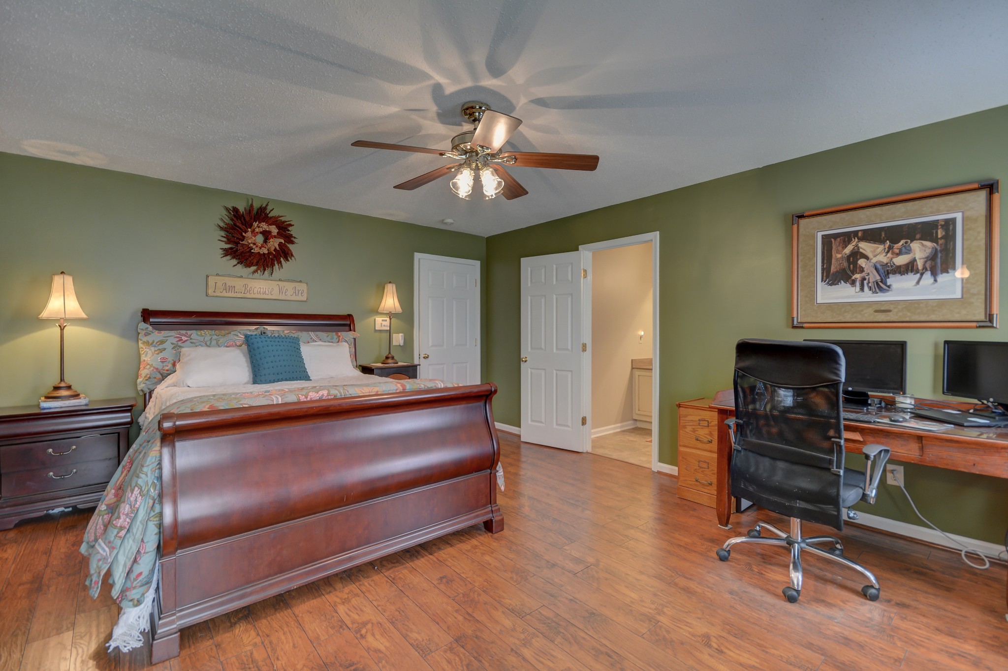2545 Plainview Pvt Ln Spring Hill Spring Hill, TN 37174 - Photo 18 of 34 a bedroom with a bed and a chandelier