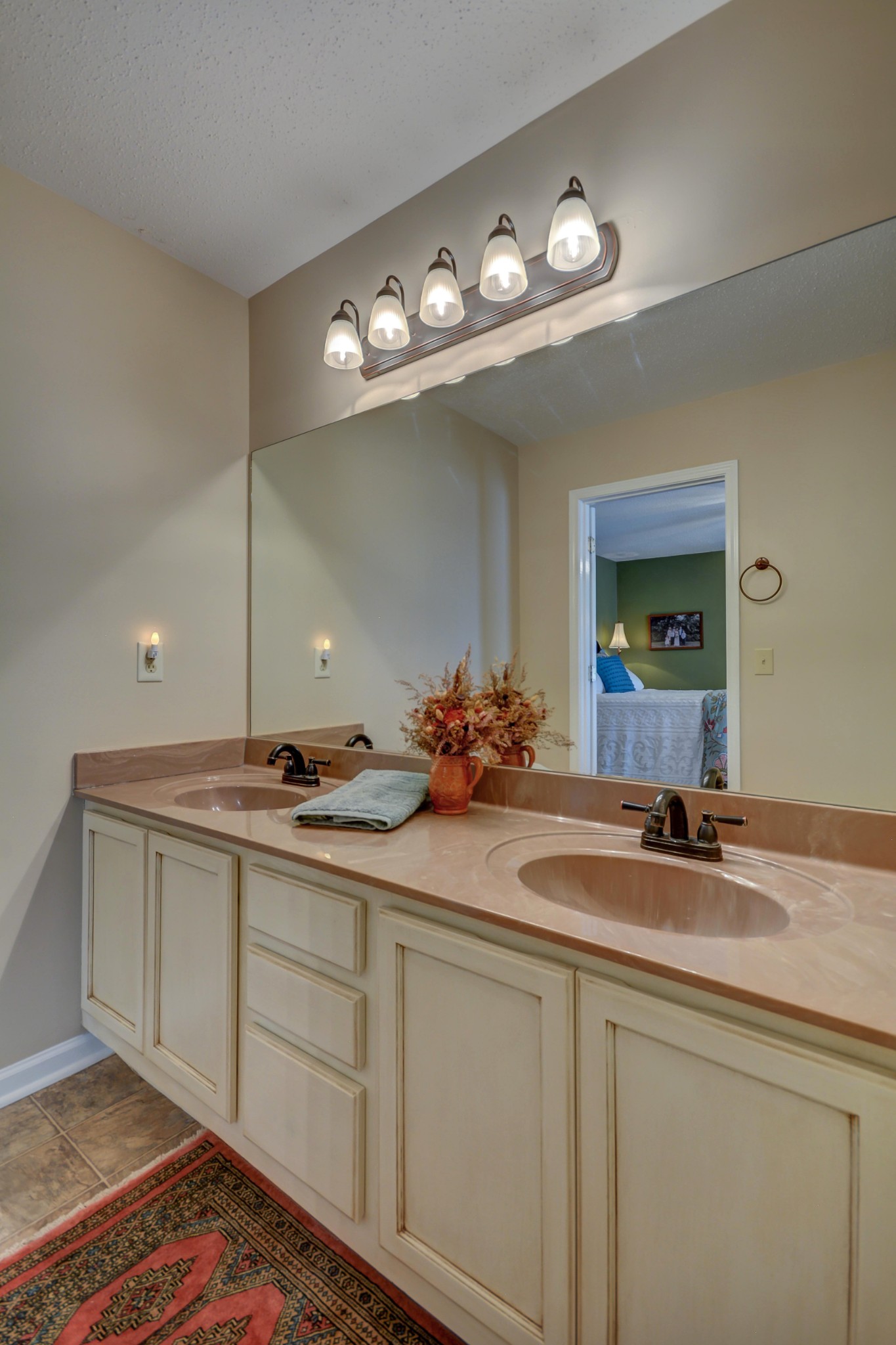 2545 Plainview Pvt Ln Spring Hill Spring Hill, TN 37174 - Photo 19 of 34 a bathroom with a sink and a mirror