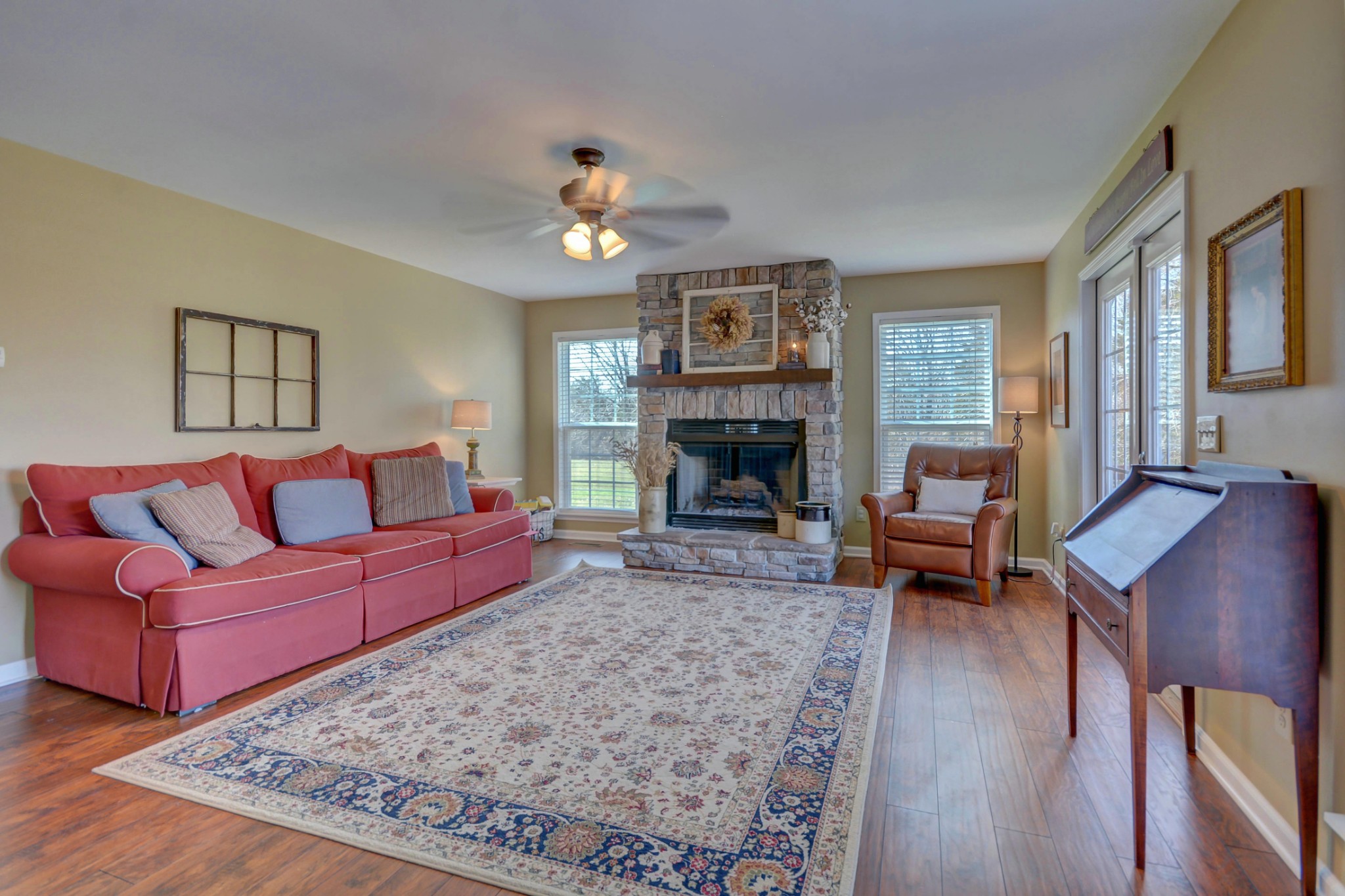 2545 Plainview Pvt Ln Spring Hill Spring Hill, TN 37174 - Photo 22 of 34 a living room with furniture and a fireplace