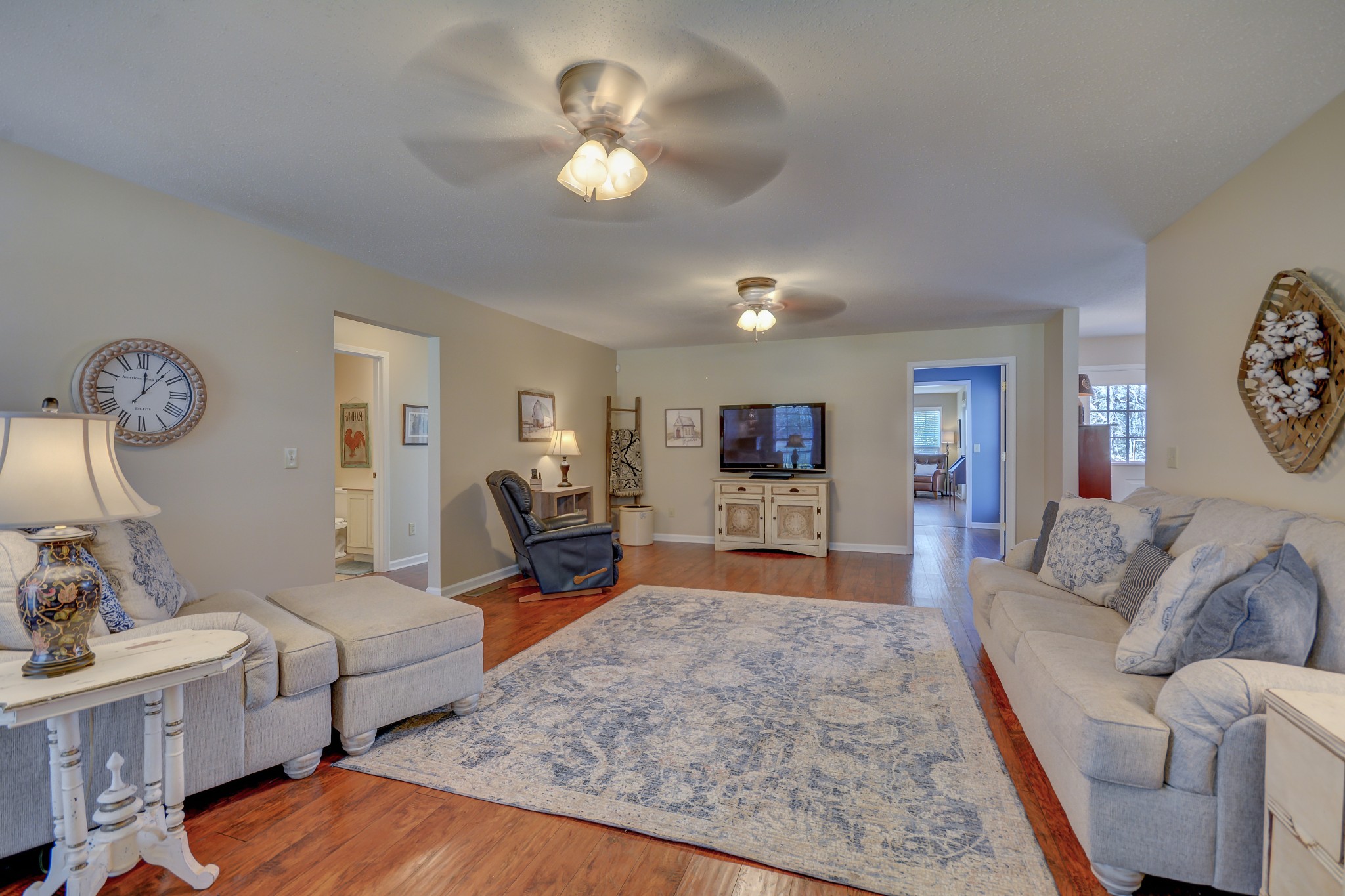 2545 Plainview Pvt Ln Spring Hill Spring Hill, TN 37174 - Photo 8 of 34 a living room with furniture and a chandelier