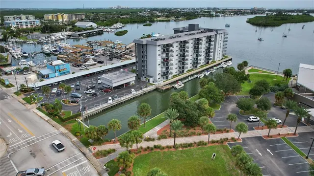 a city view from a balcony with chairs