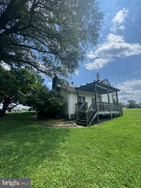 2948 Grier Nursery Road Forest Hill, MD 21050 - Photo 2 of 5 a view of a chair and table in backyard of the house