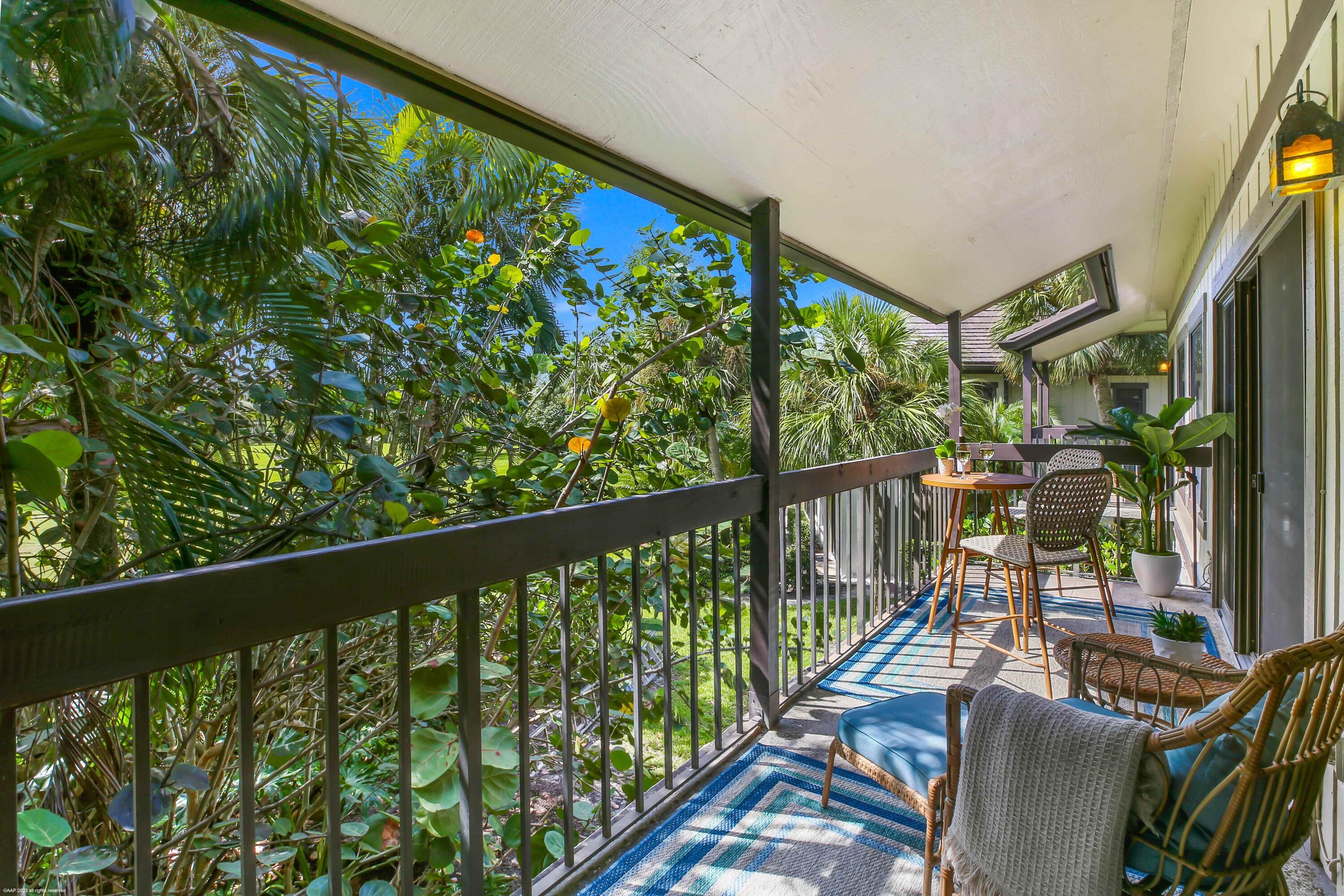 13334 Polo Club Road, Unit 346 Wellington, FL 33414 - Photo 5 of 19 a view of balcony with furniture