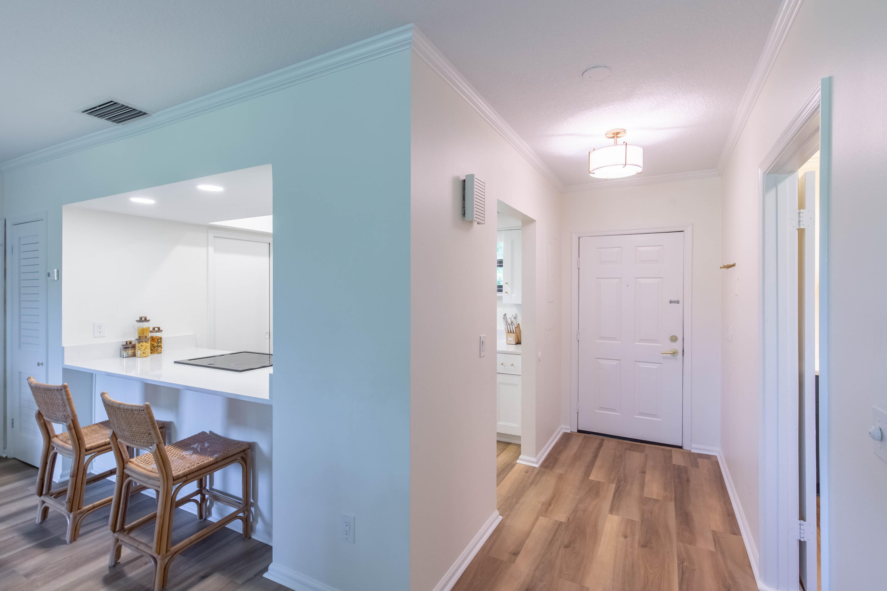 13334 Polo Club Road, Unit 346 Wellington, FL 33414 - Photo 9 of 19 a view of a room that has a table and chairs in it