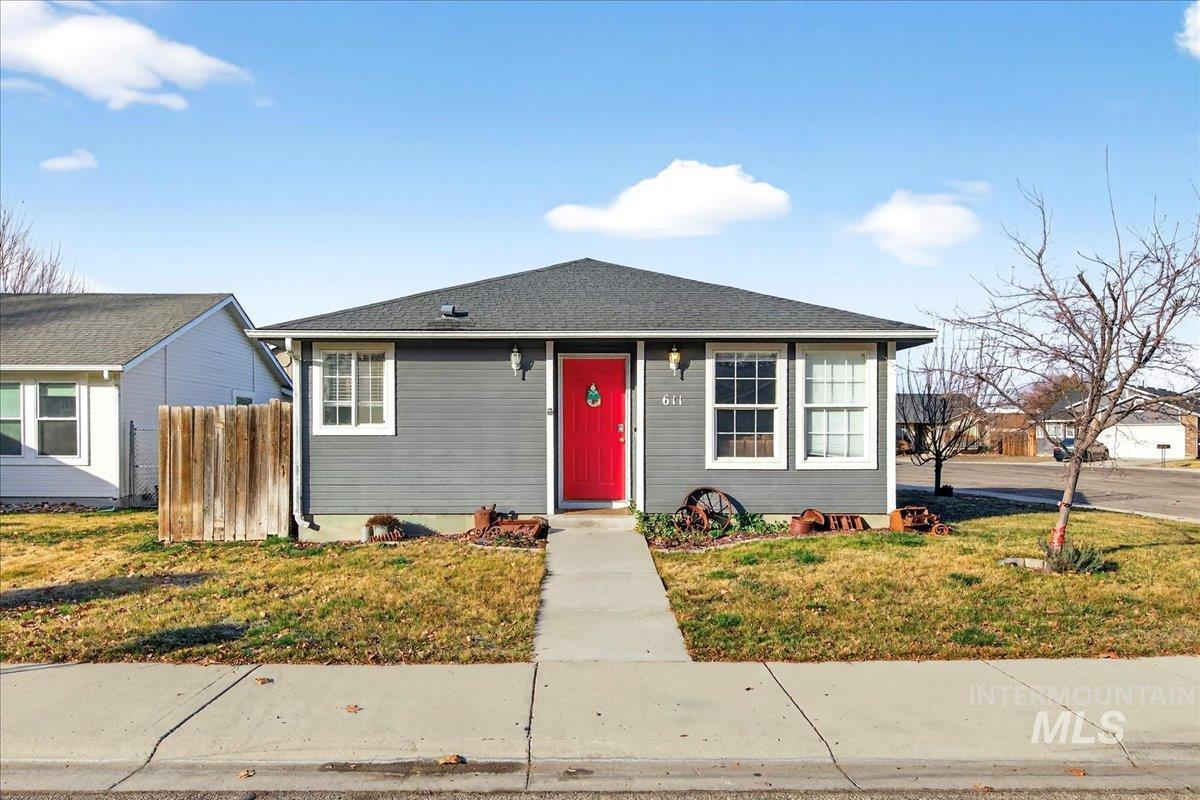 View of front of home featuring a shingled roof
