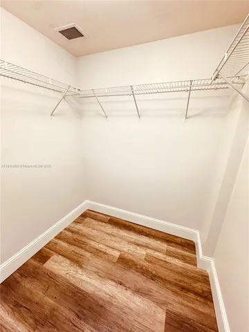 a view of a room with racks on the wall