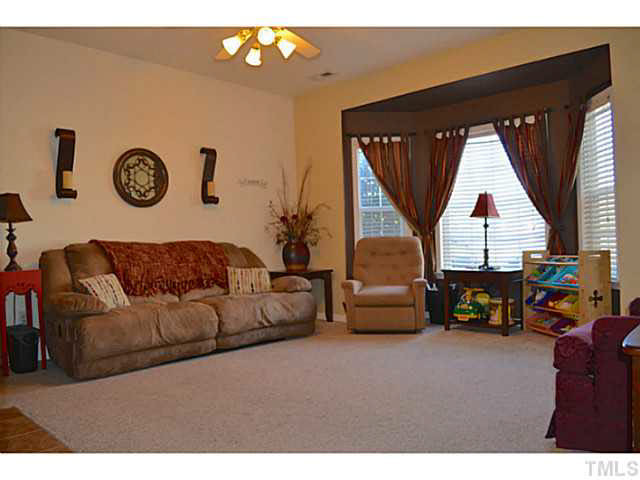 249 Dairy Road Clayton, NC 27520 - Photo 4 of 24 Large bay window brings allows for abundant natural light... Den/Family/Great Room