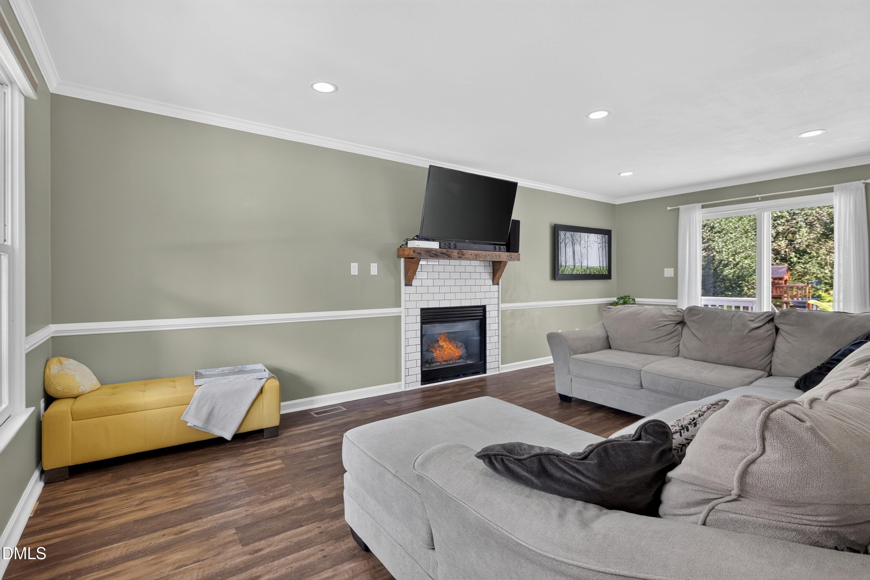 2020 Stonepond Lane Raleigh, NC 27603 - Photo 21 of 68 Fire in fireplace is virtually staged.