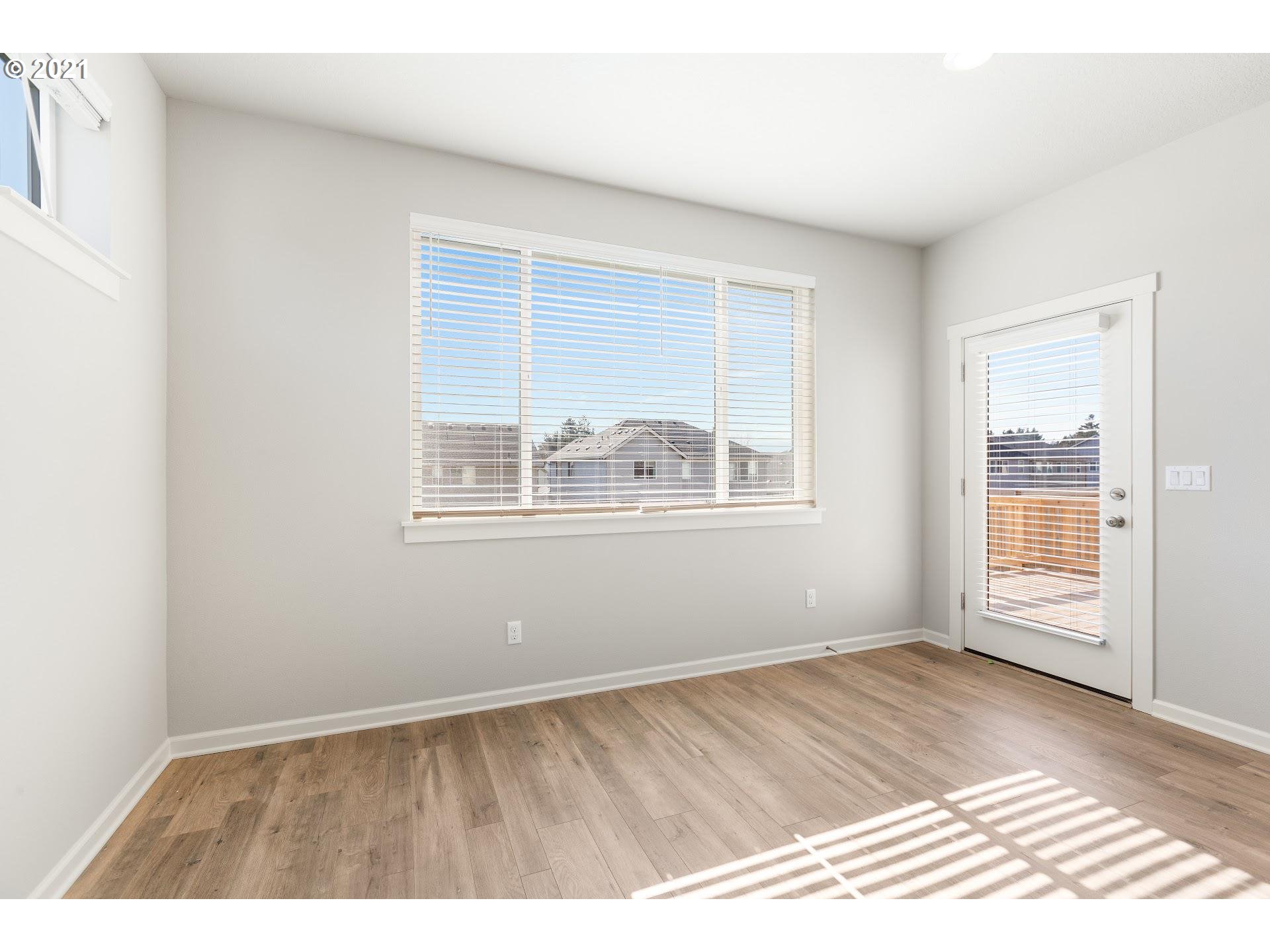 3745 South 42nd Place Ridgefield, WA 98642 - Photo 10 of 23 a view of an empty room with a window