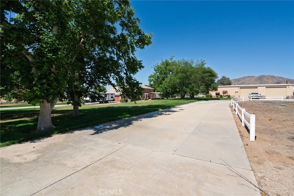 34150 Stowe Road Winchester, CA 92545 - Photo 68 of 80 a view of a street with houses on both side