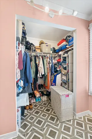 a bathroom with a sink a mirror and a shower