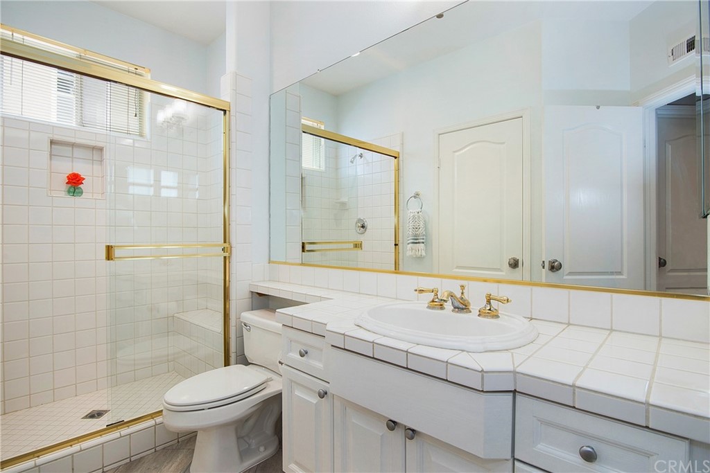 3 Altimira Coto de Caza, CA 92679 - Photo 17 of 38 Full bathroom downstairs can be accessed directly from bedroom OR hallway for convenience.