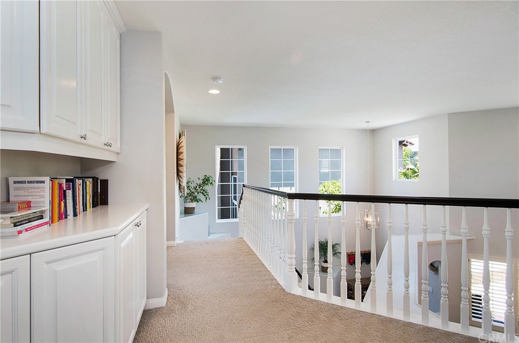 3 Altimira Coto de Caza, CA 92679 - Photo 18 of 38 Hall upstairs with view of downstairs and picturesque windows.