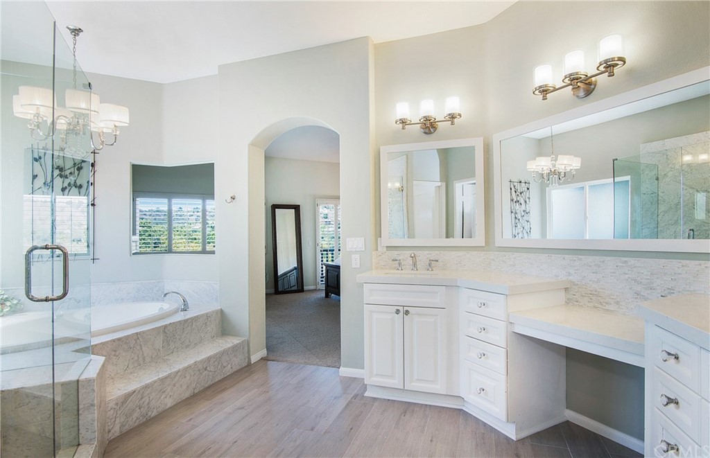 3 Altimira Coto de Caza, CA 92679 - Photo 22 of 38 Imagine a relaxing soak in this marble adorned tub adjacent to separate hand crafted marble shower.