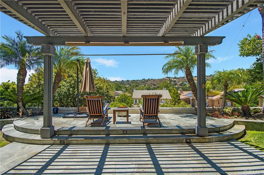 3 Altimira Coto de Caza, CA 92679 - Photo 26 of 38 Imagine entertaining around the fire pit area raised with gorgeous slate stone.