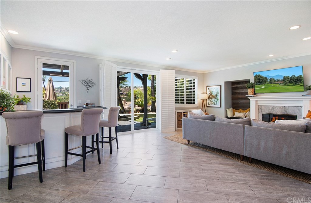 3 Altimira Coto de Caza, CA 92679 - Photo 7 of 38 Spacious Living Area with adjacent wet bar (shows door directly into bar area)
