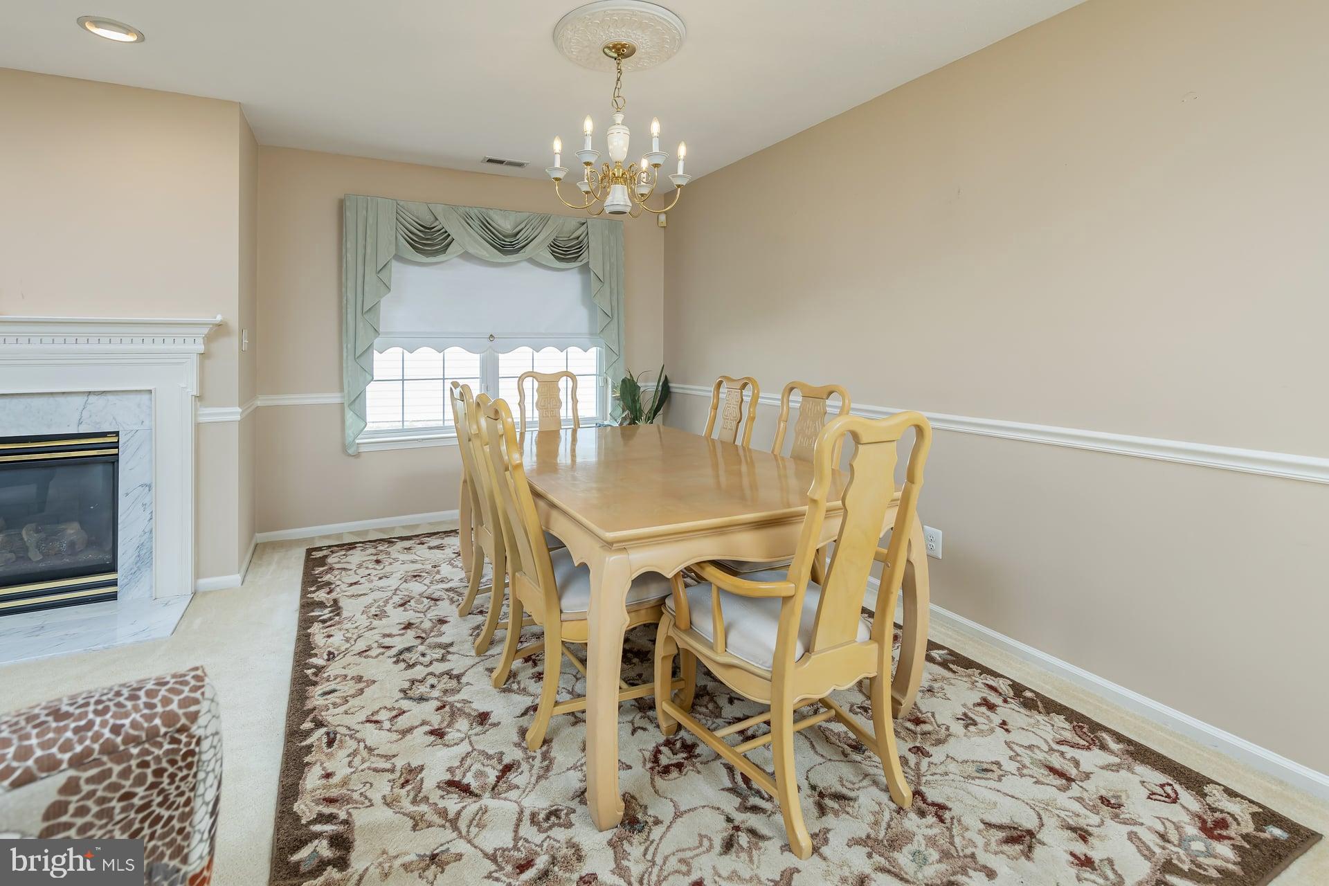 41 Grandview Place Sewell, NJ 08080 - Photo 11 of 23 a view of a dining room with furniture and chandelier