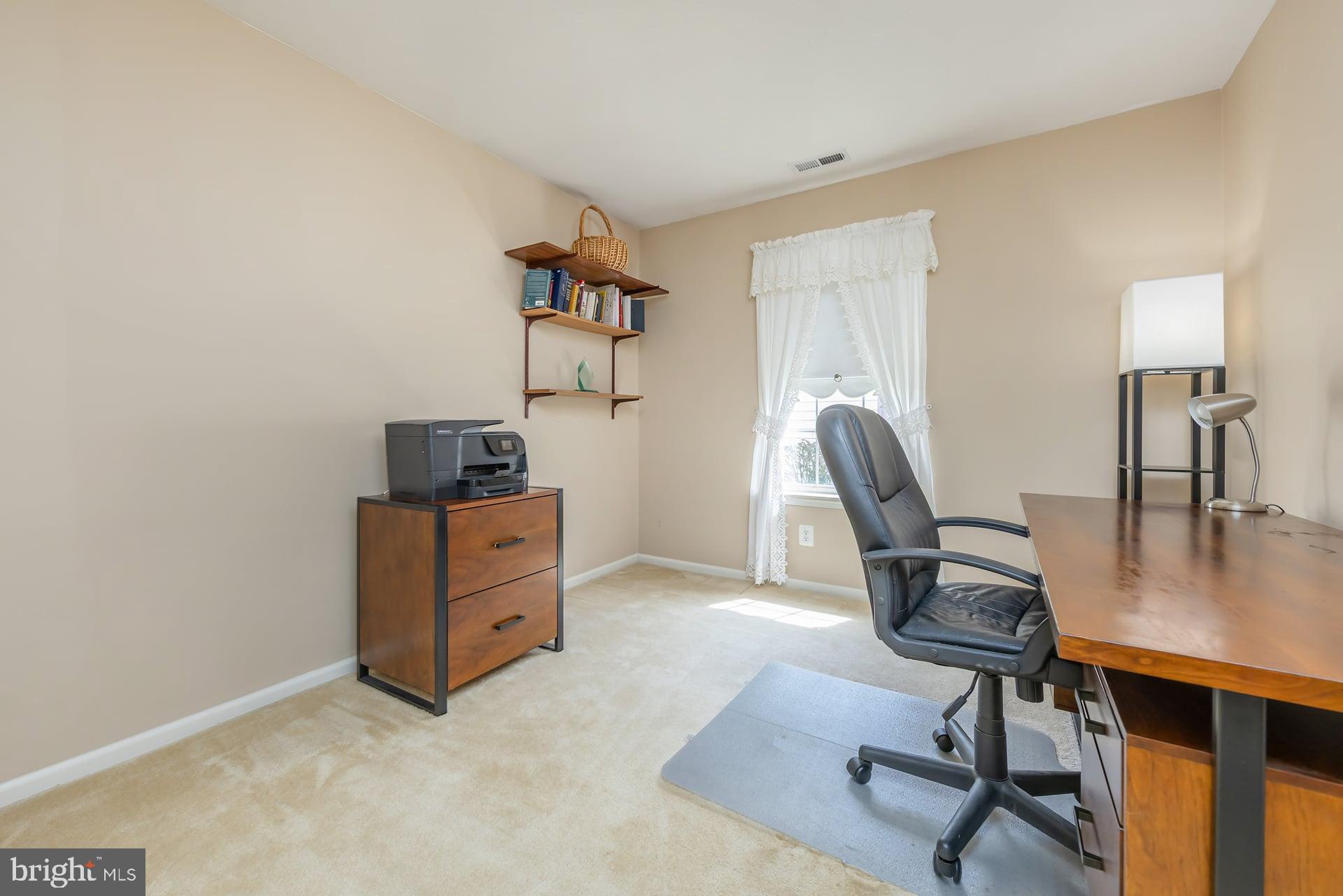 41 Grandview Place Sewell, NJ 08080 - Photo 12 of 23 a room with furniture and a window