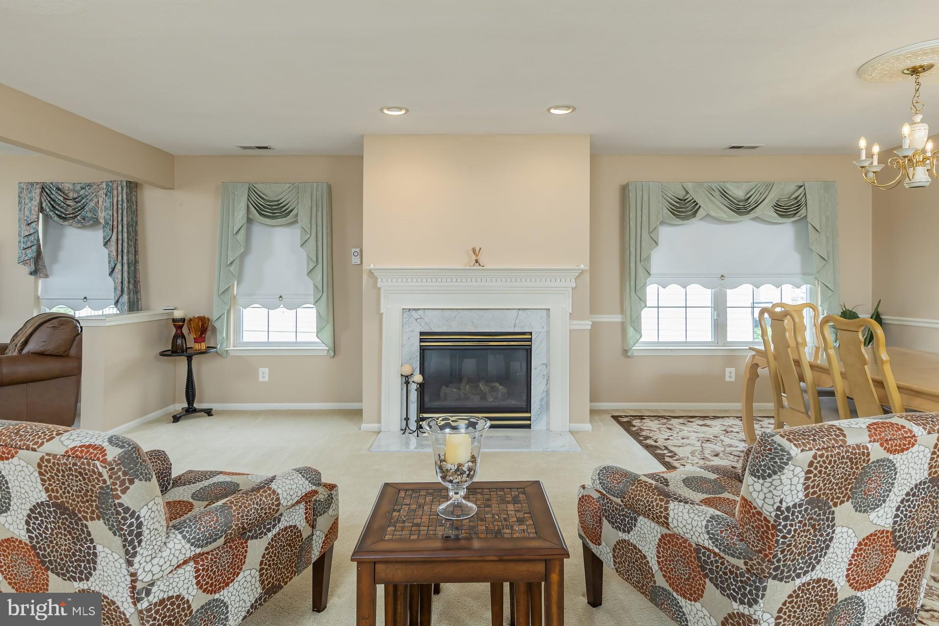 41 Grandview Place Sewell, NJ 08080 - Photo 5 of 23 a living room with furniture and a fireplace