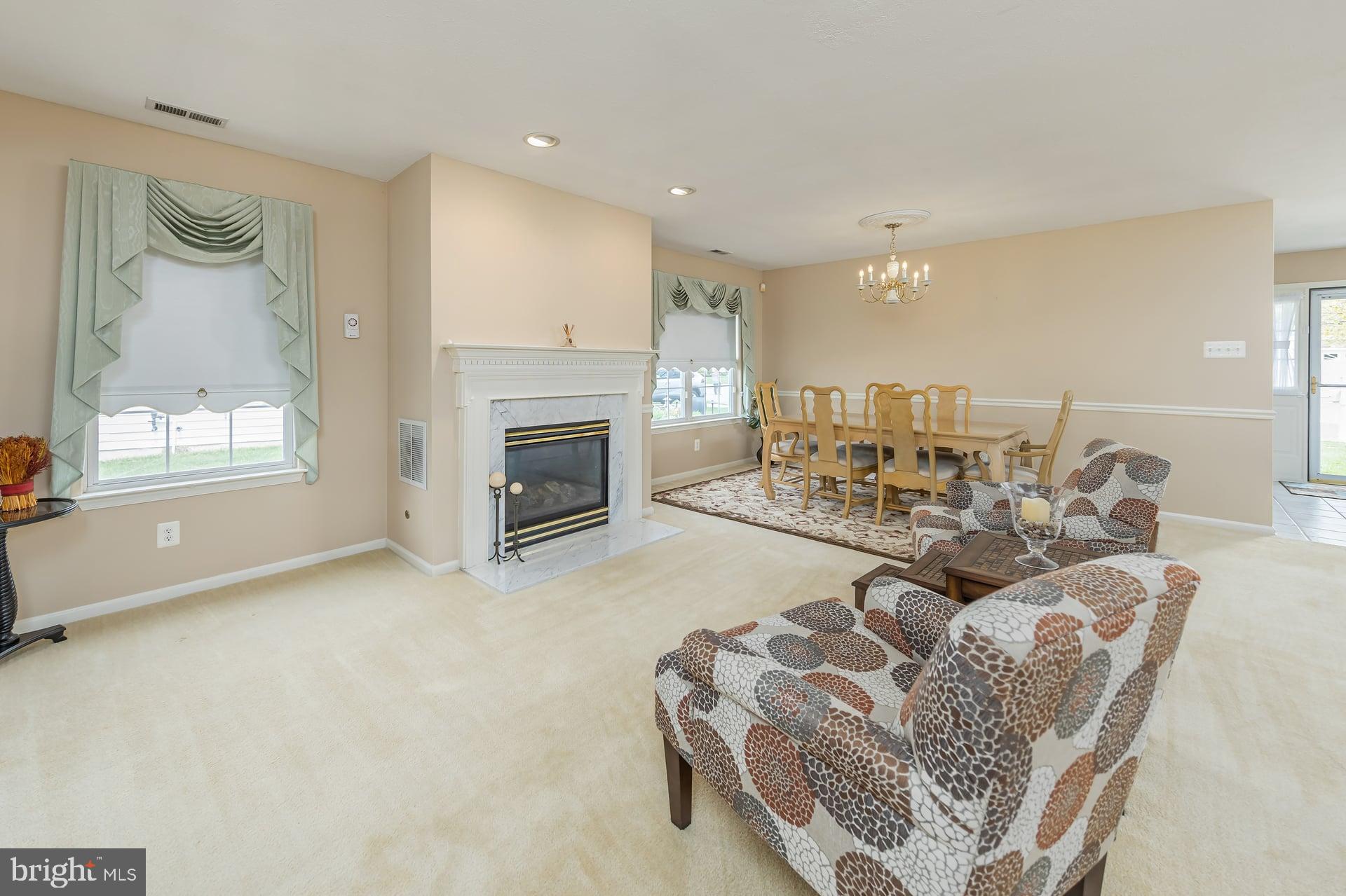 41 Grandview Place Sewell, NJ 08080 - Photo 6 of 23 a living room with furniture and a fireplace