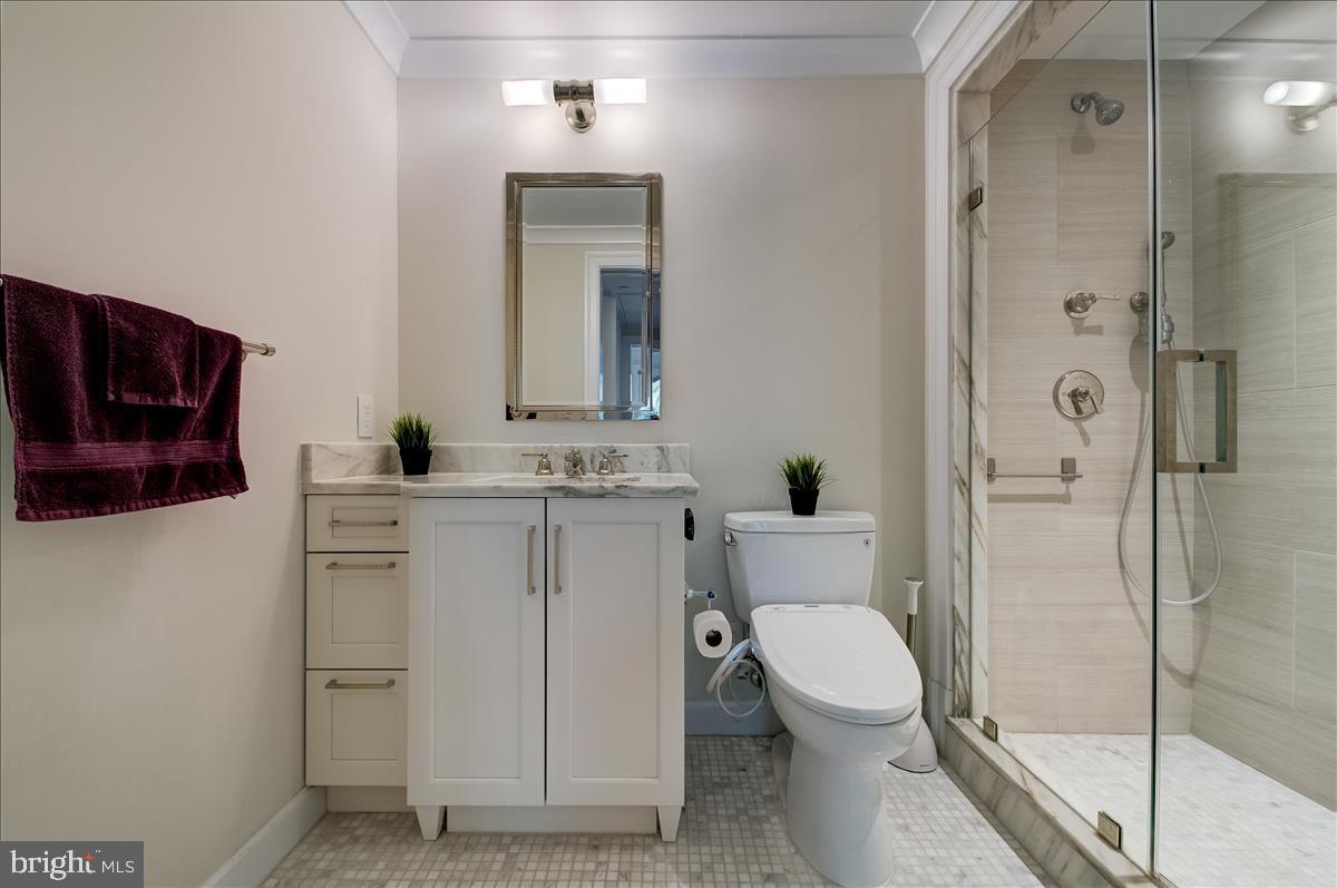 1108 16th Street Northwest, Unit 604 Washington, DC 20036 - Photo 9 of 26 A bathroom with a spacious shower room