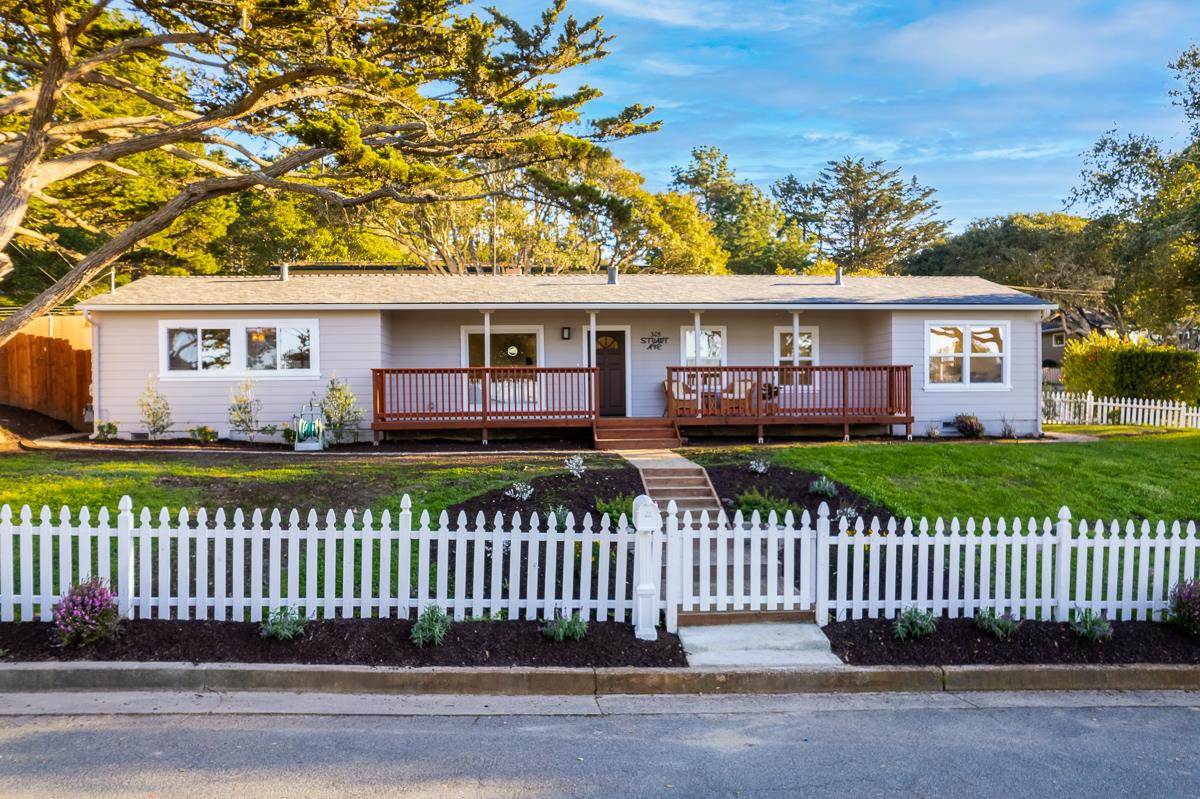 305 Stuart Avenue Pacific Grove, CA 93950 - Photo 2 of 55 a front view of a house with a garden