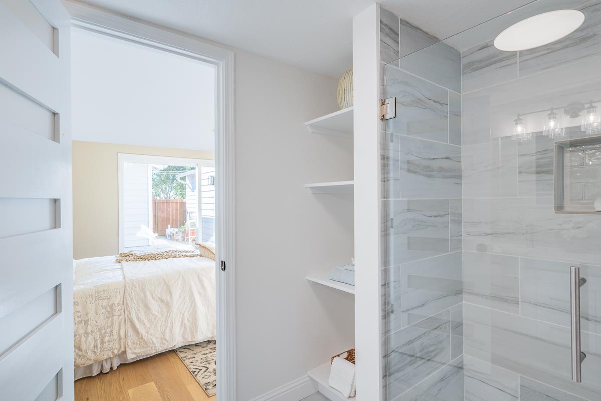 305 Stuart Avenue Pacific Grove, CA 93950 - Photo 30 of 55 a bathroom with a tub and shower